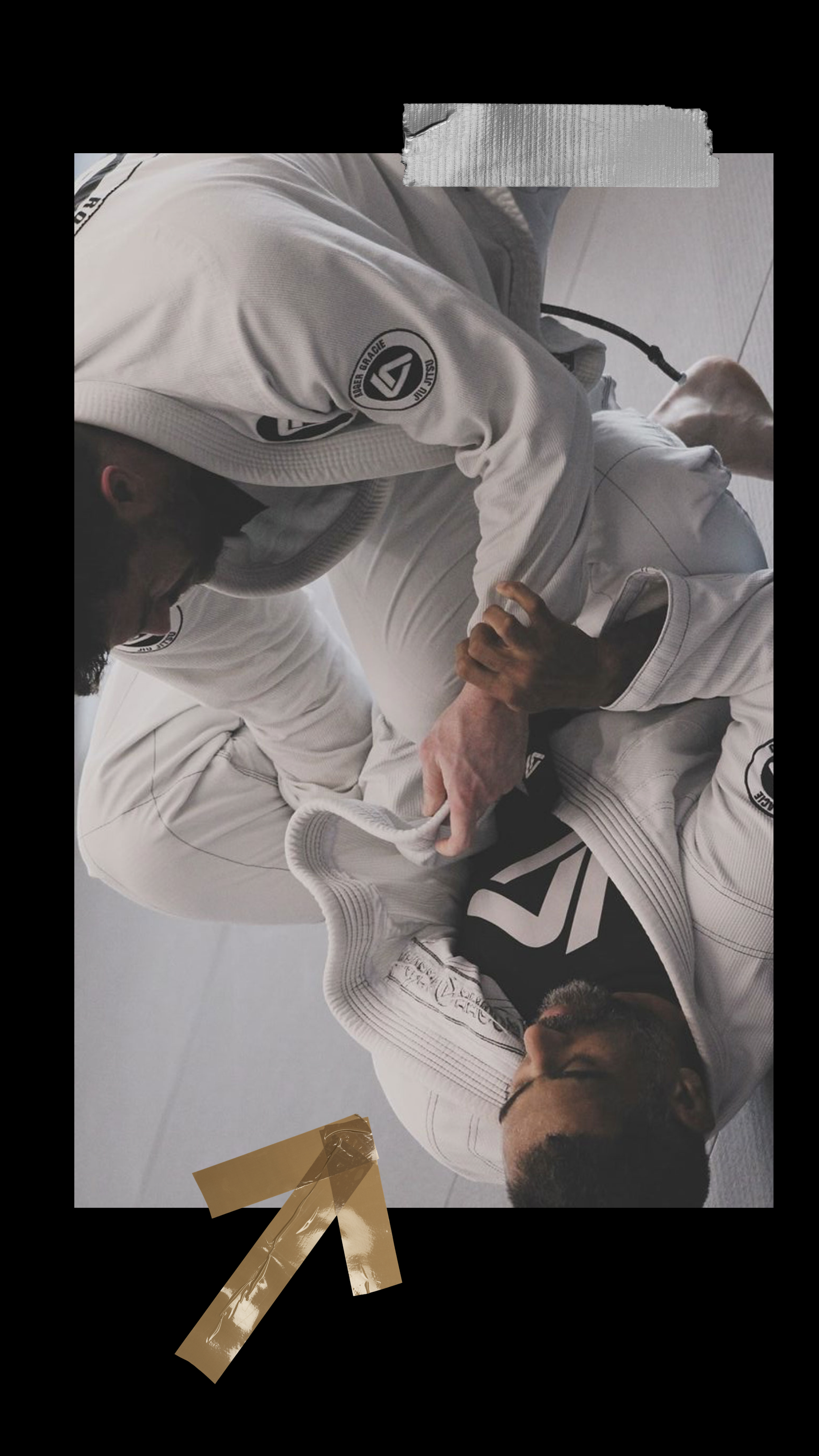 Professor Alex Faria working a position on the mat